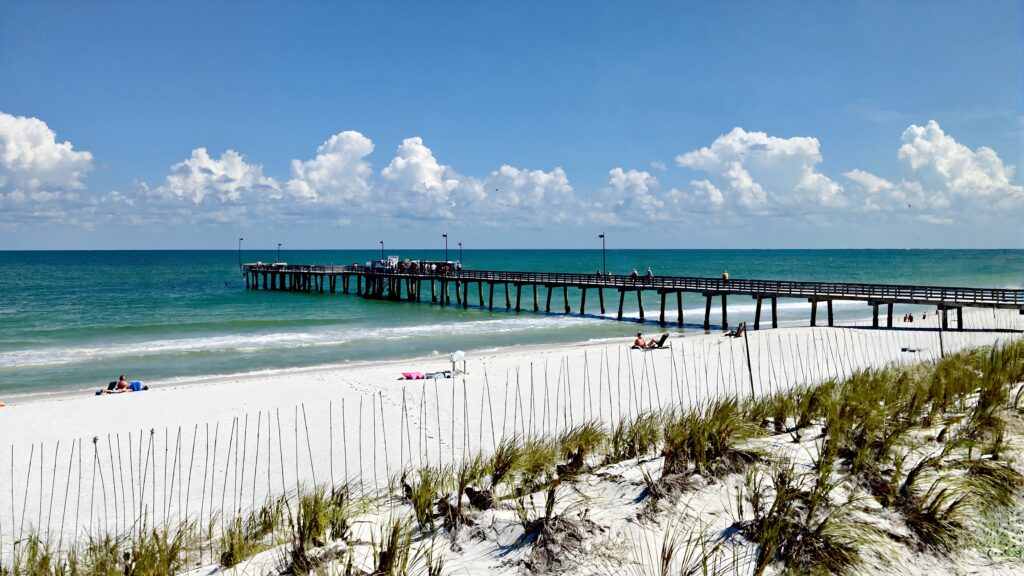 Navarre Beach Fishing Pier reaching over the emerald Gulf of Mexico on the Emerald Coast