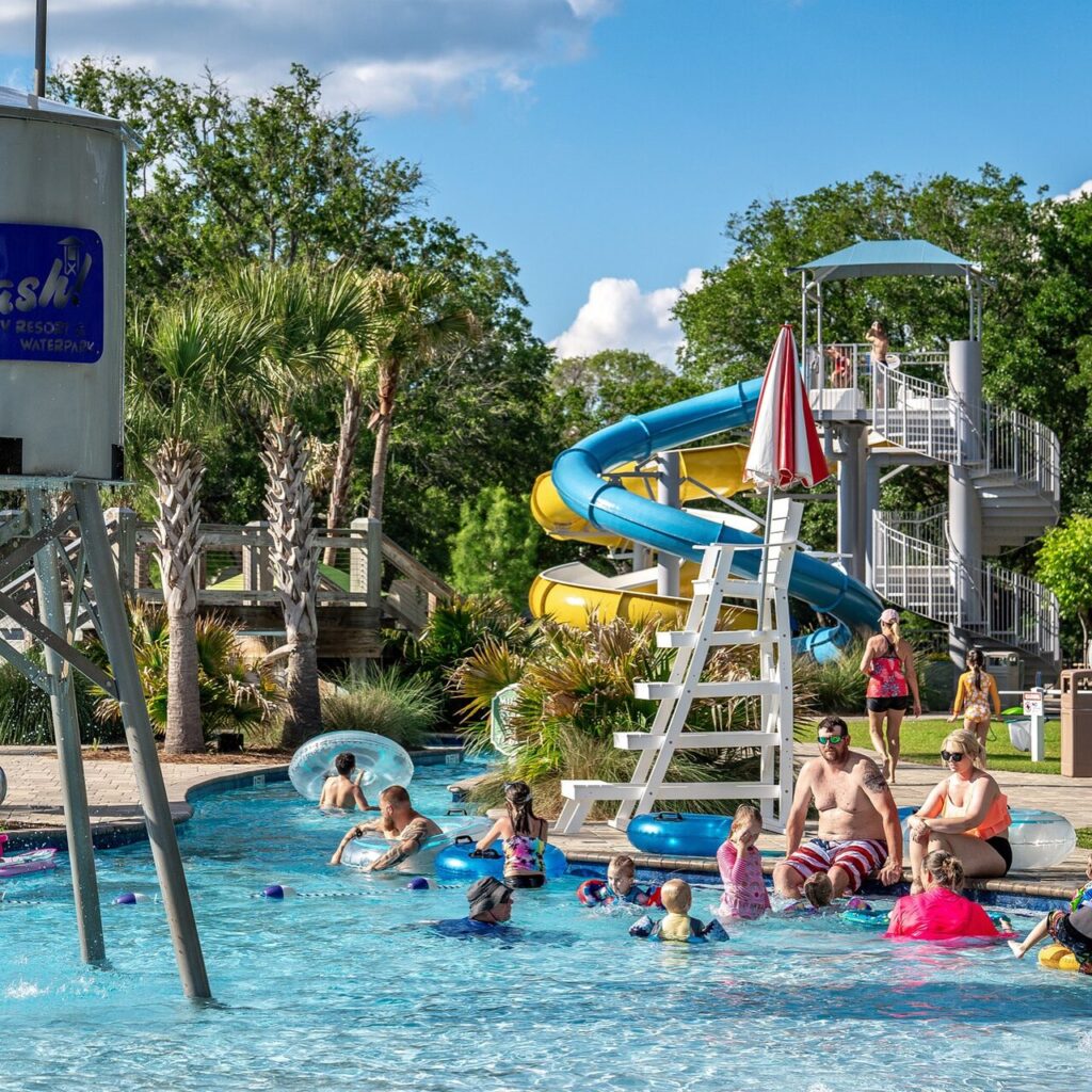 Families enjoying the lazy river water attraction at Splash RV Resort near Pensacola