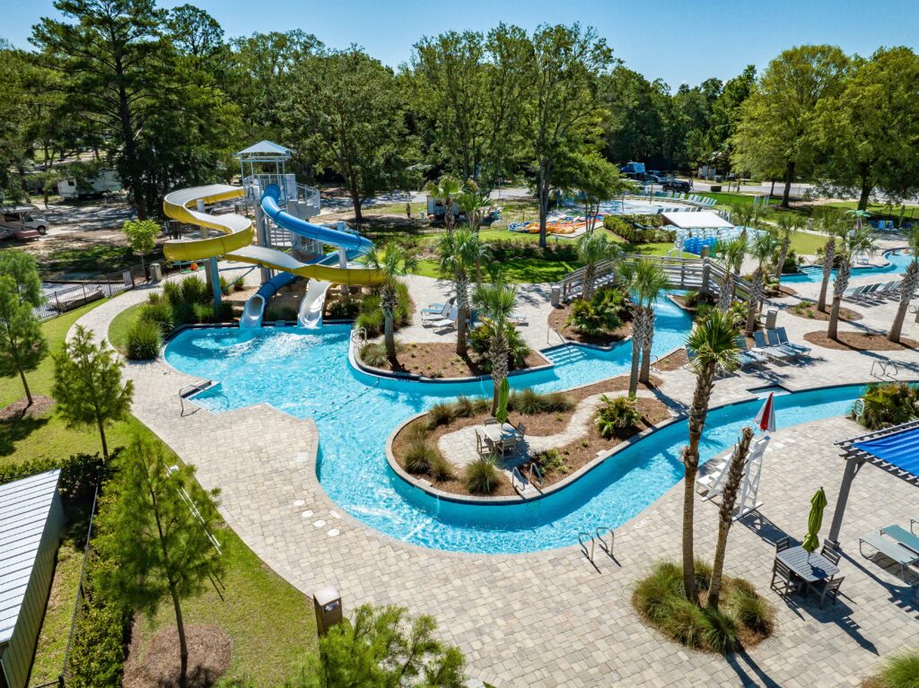 Aerial view of the lazy river, water slides, and pools at Splash RV Resort in Milton, Florida