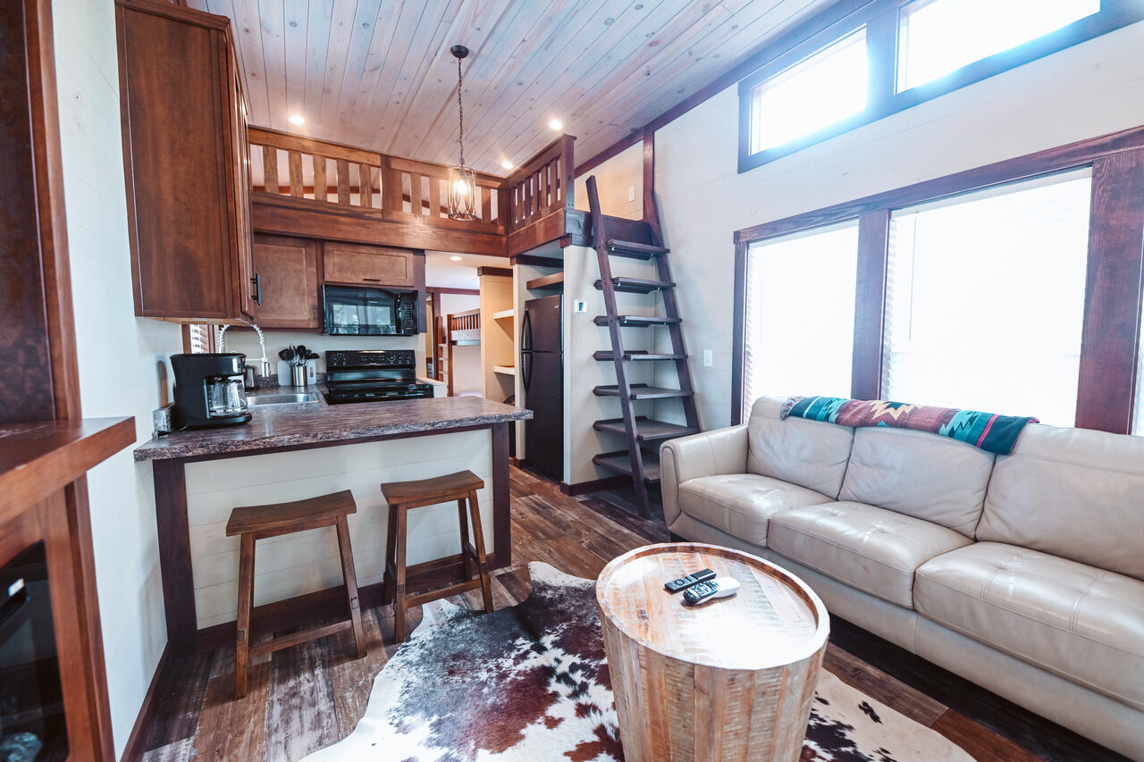 Luxury cottage interior with full kitchen at Splash RV Resort near Pensacola