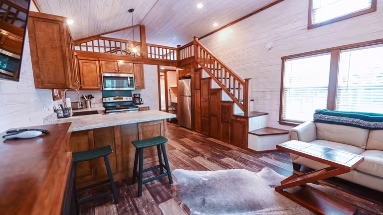 Full-kitchen luxury cottage interior at cabins in Milton, FL