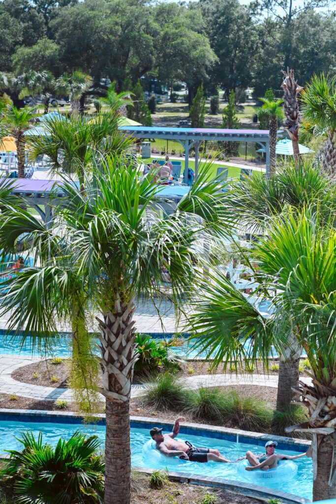 Guests floating down the year-round lazy river at Splash RV Resort