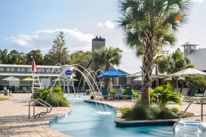 Lazy river and pools at Splash RV Resort near Navarre Beach on a sunny day
