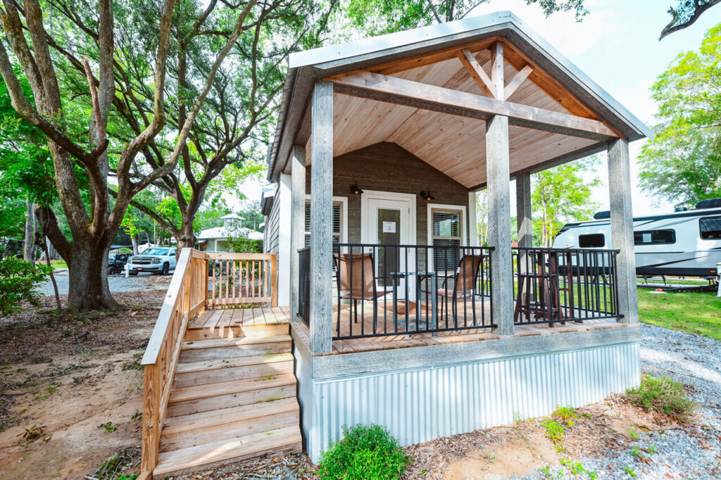 Luxury cottage with covered porch at Splash RV Resort near Destin