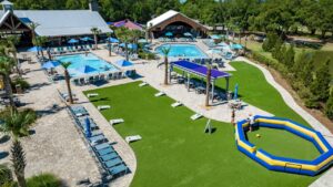 Aerial view of the pools and recreation area at Splash RV Resort near Orange Beach