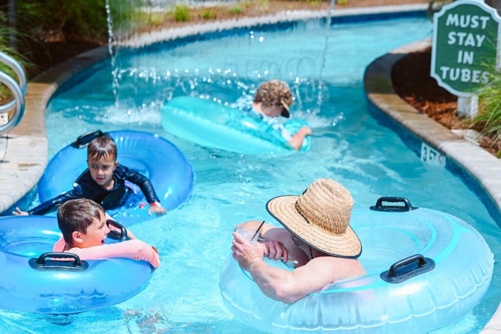 Guests floating the lazy river water attraction at Splash RV Resort in Milton FL
