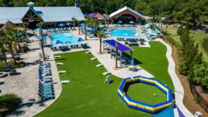 Aerial view of the RV park near Pensacola at Splash RV Resort with pools and a lawn
