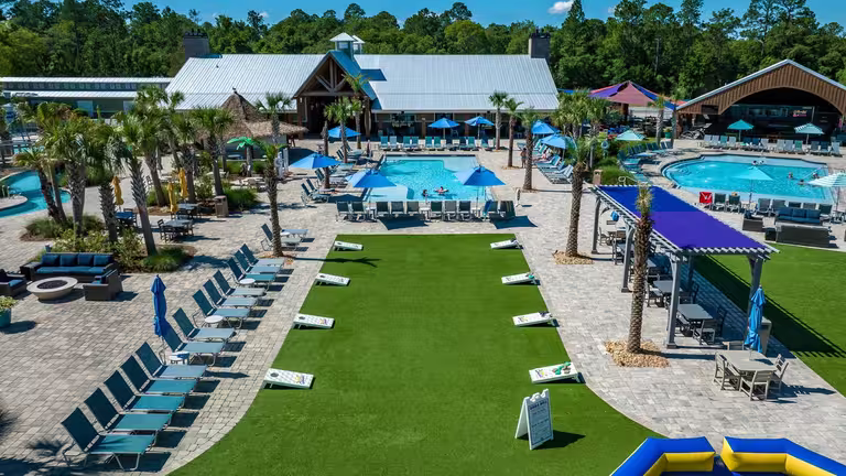 Aerial view of the pool deck, lazy river and lounge area at Splash RV Resort near Navarre Beach FL