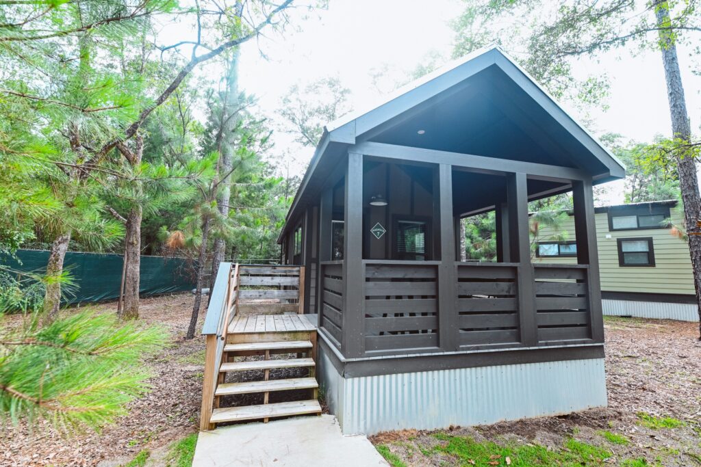 Luxury cottage with a screened porch at Splash RV Resort near Pensacola FL