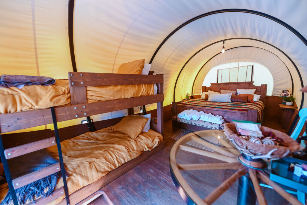 A Conestoga-style glamping wagon at Splash RV Resort near Navarre Beach
