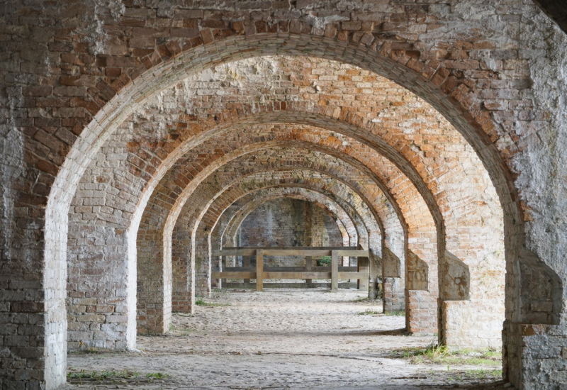 Historic brick archways at Fort Pickens, a nearby attraction close to Splash RV Resort in Milton, Florida.