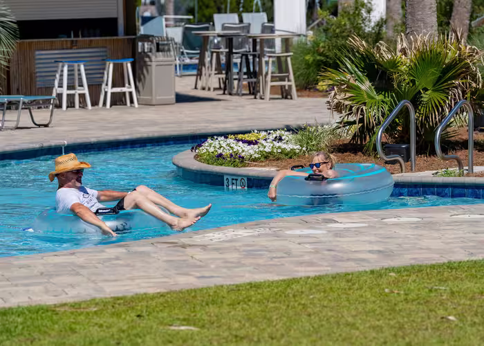 Couple tubing on the lazy river at Splash RV Resort in Milton, FL